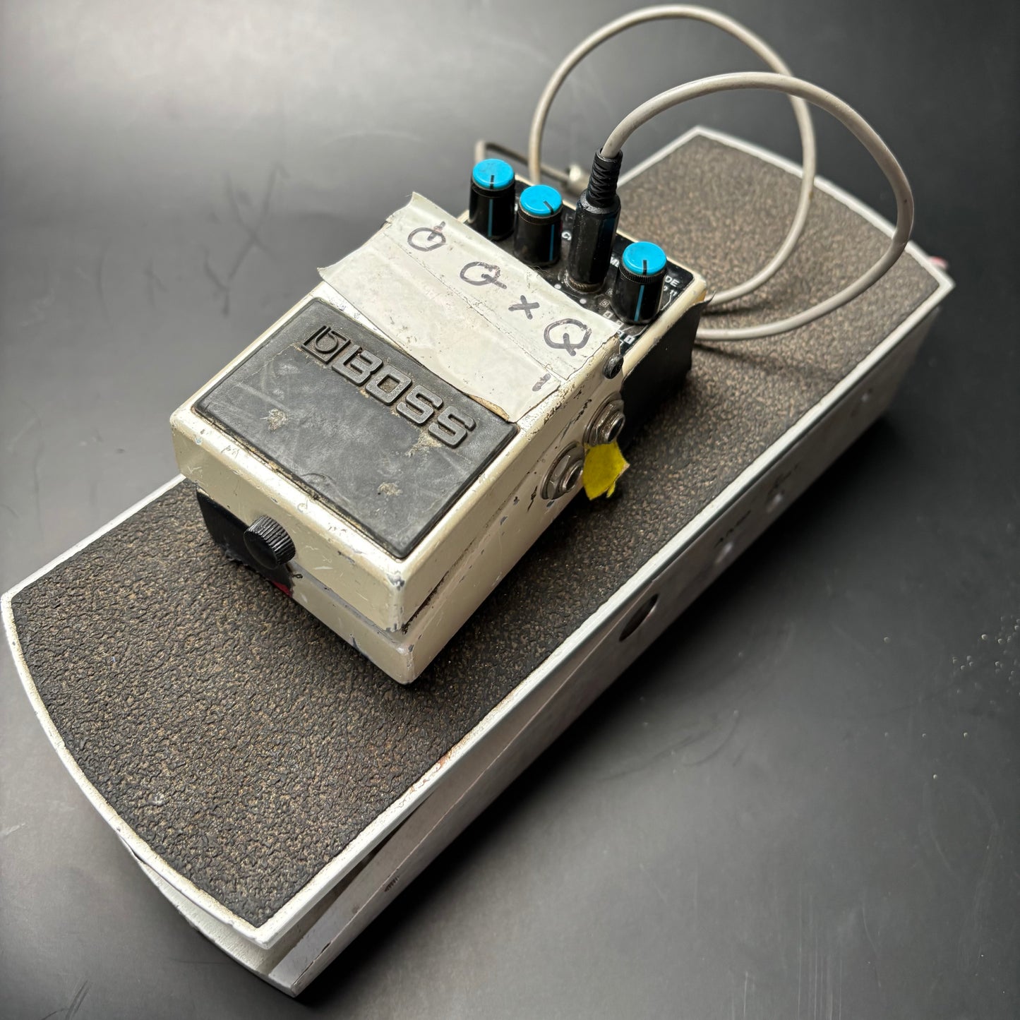 Boss Delay (modified) with Ernie Ball pedal to control delay time