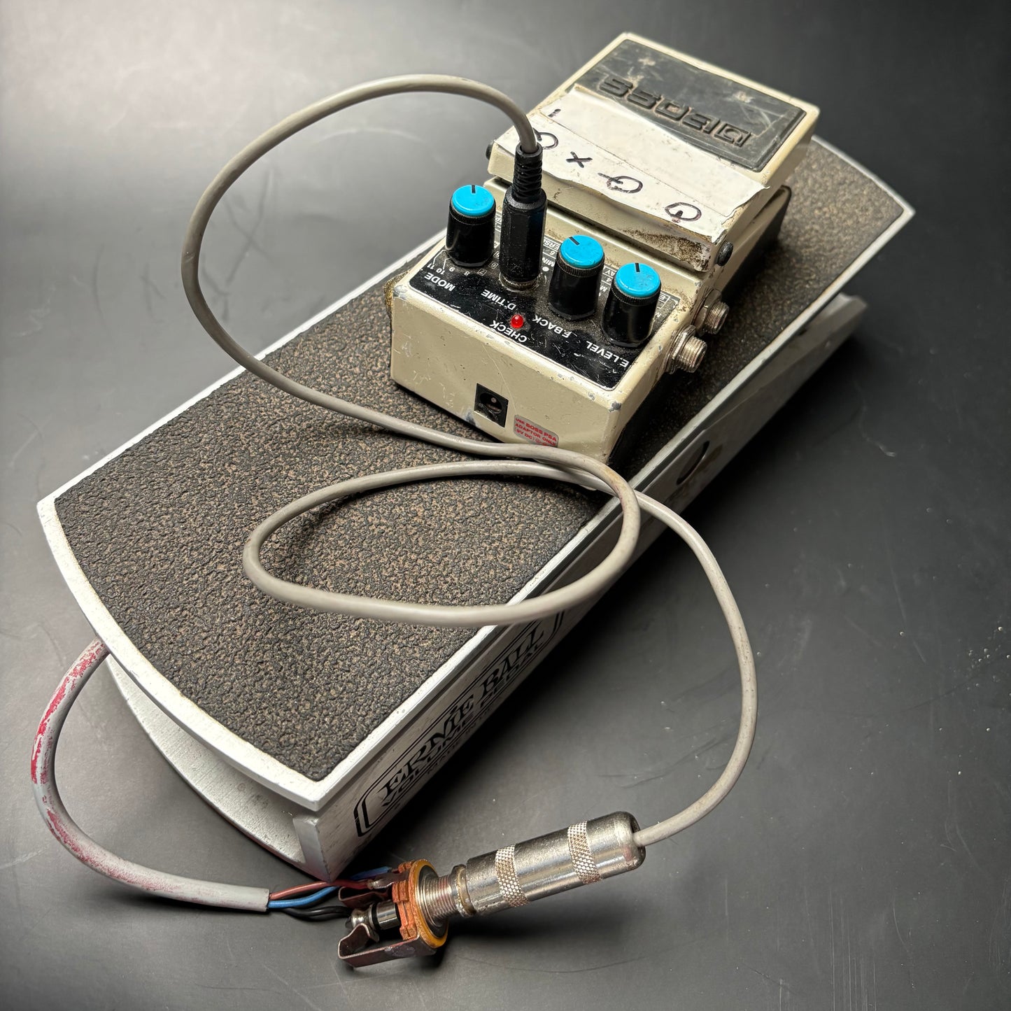 Boss Delay (modified) with Ernie Ball pedal to control delay time