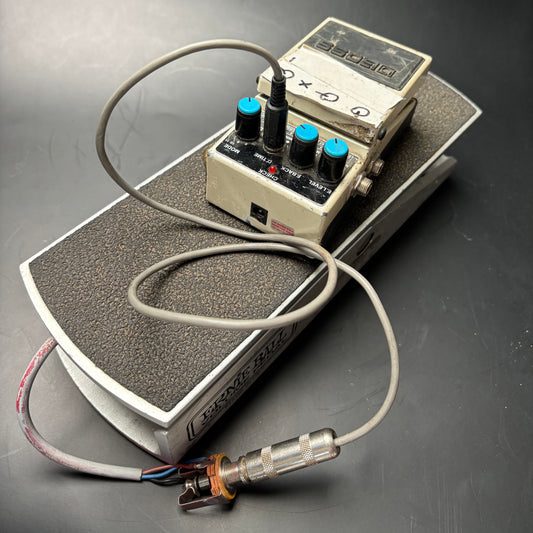 Boss Delay (modified) with Ernie Ball pedal to control delay time