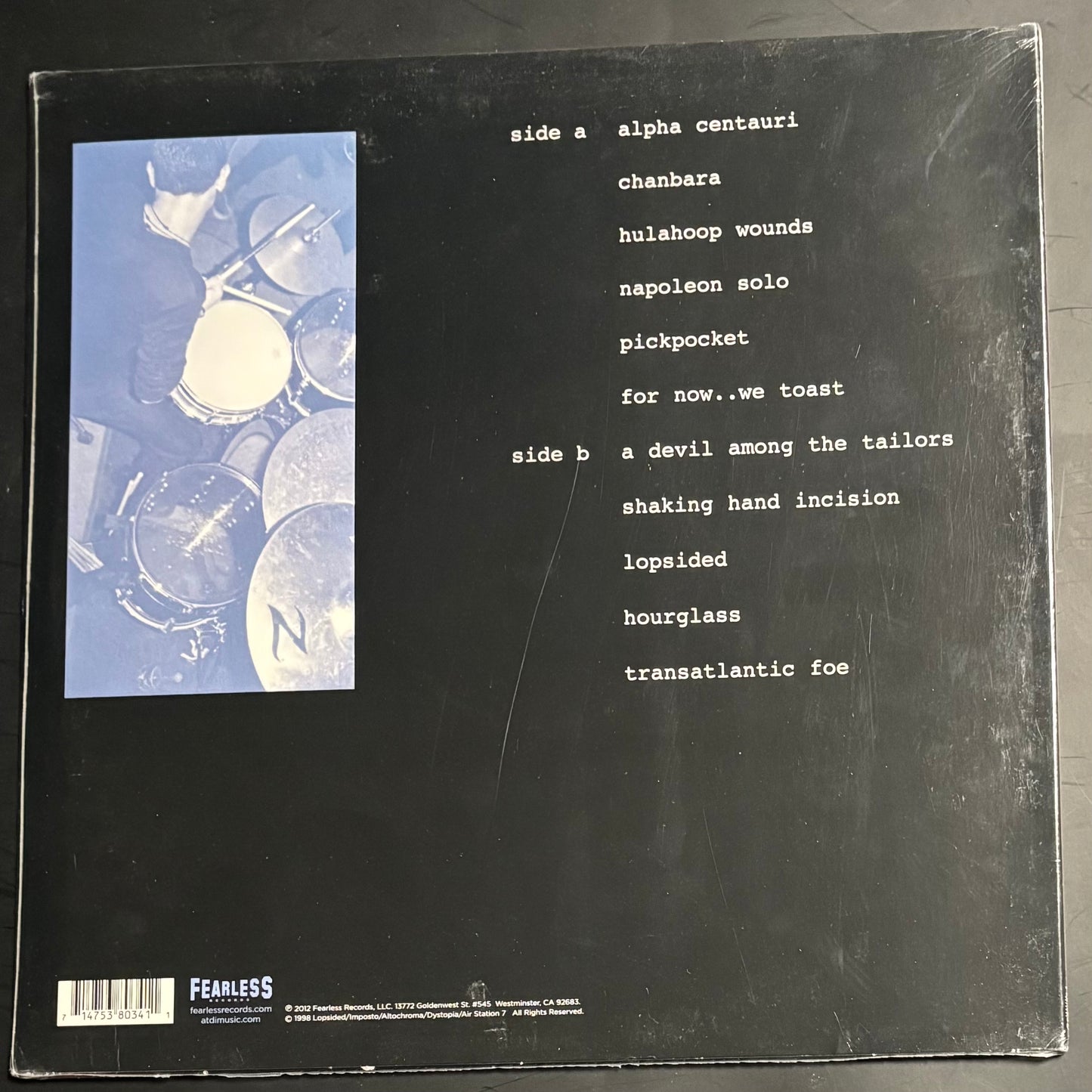 AT THE DRIVE-IN - IN/CASINO/OUT (GRAY/PINK SPLATTER) LP
